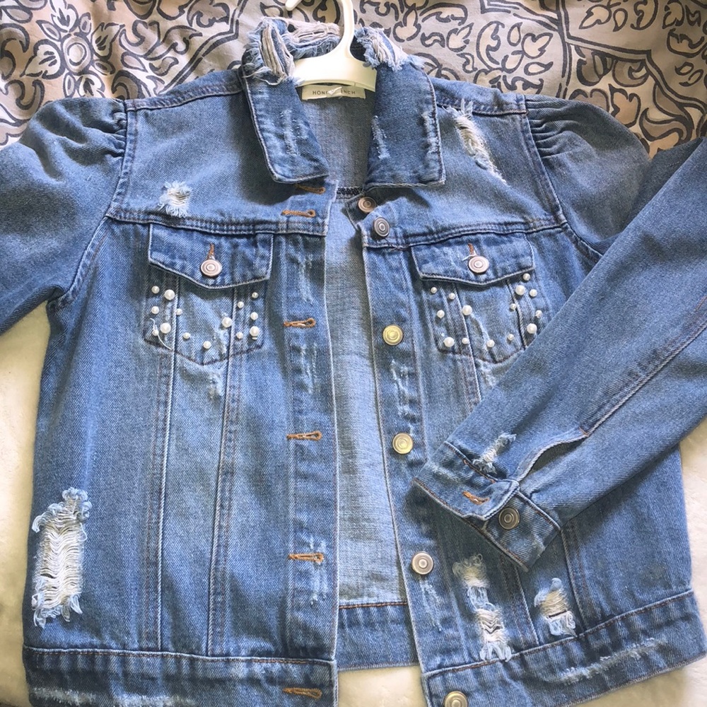 Distressed studded Jean jacket